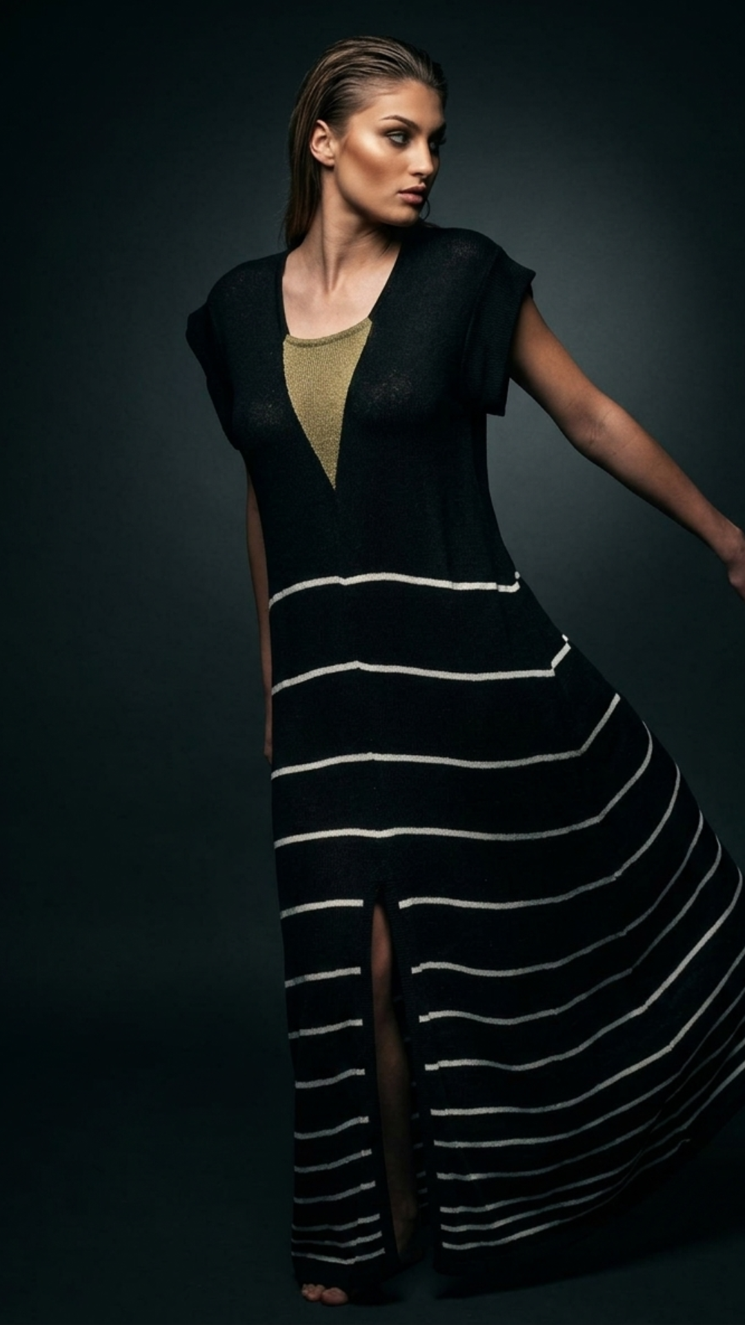 Detail of black dress neckline with moss green insert, contemporary elegant handmade design