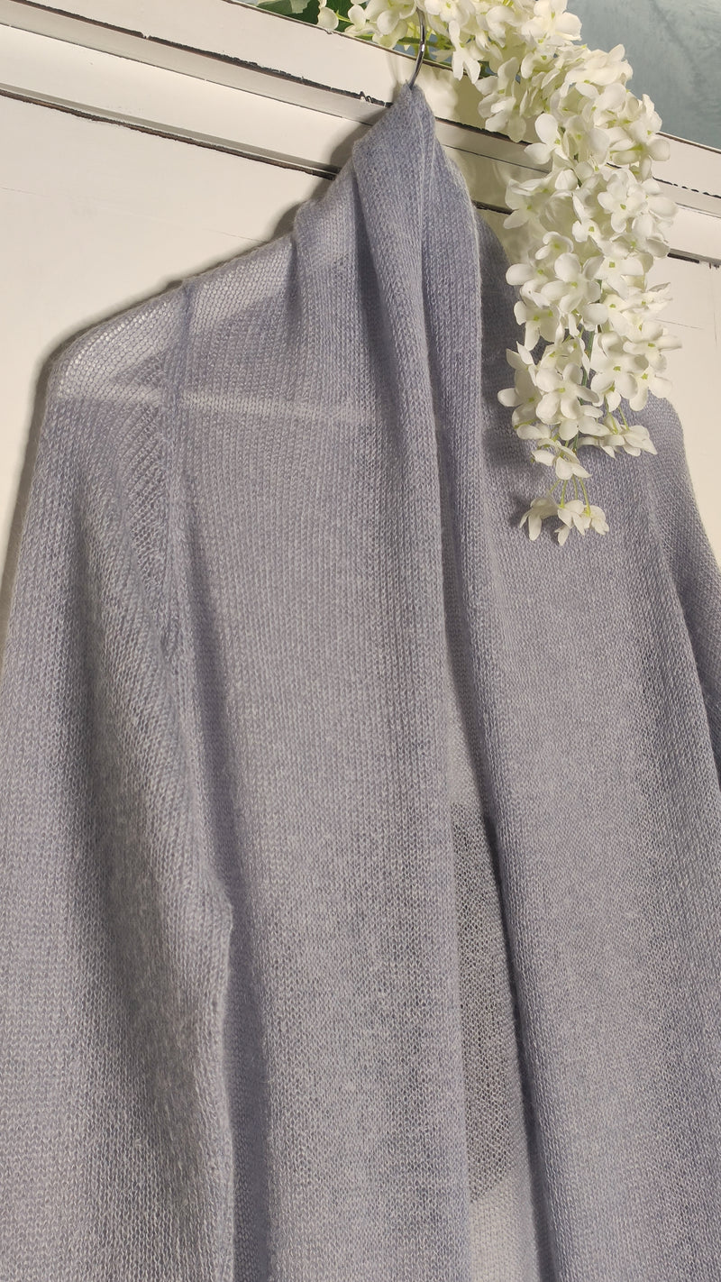 detail of the transparency of the lilac cardigan