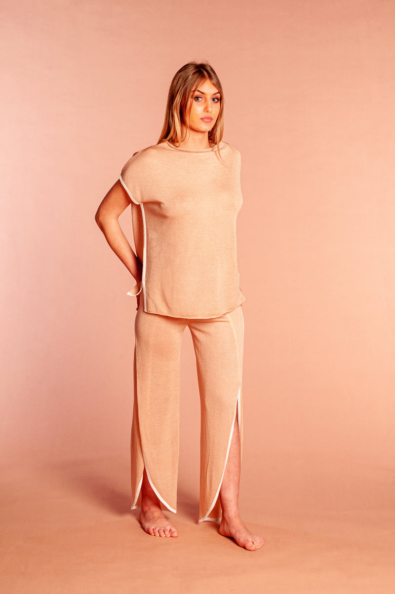 Elegant tulip pants and sweater suit in powder viscose with white Mela edges prive