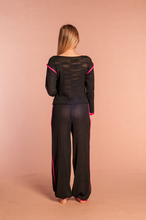 Yoga jumpsuit in cool black and fuchsia stretch sikkin