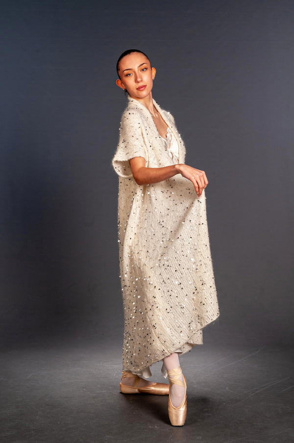 Side view of mohair and silk coat with large silver sequins in teardrop shape