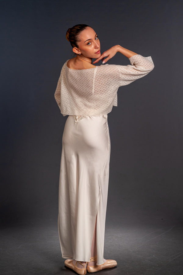 Back view of white cashmere and silk box sweater