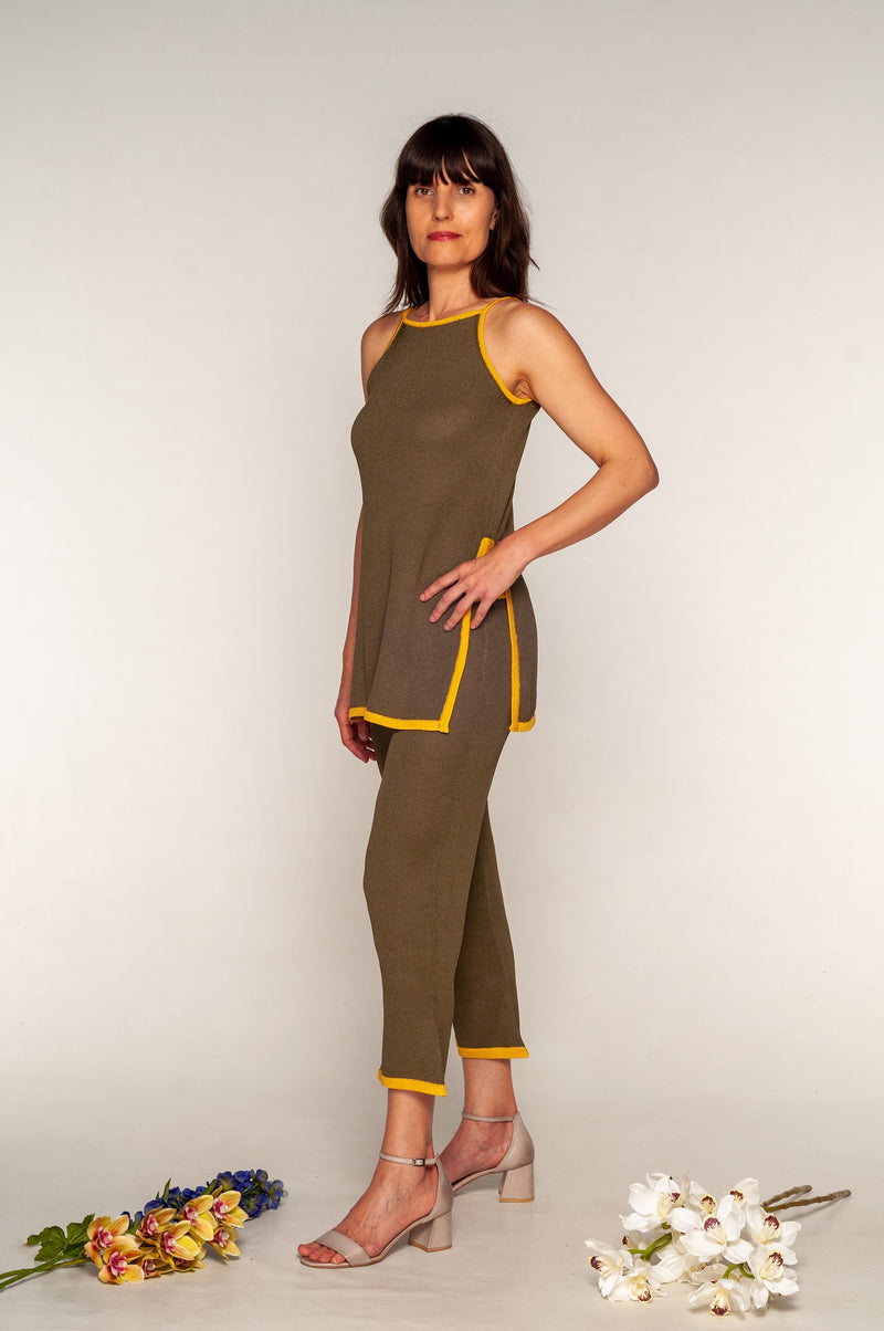 Side view of the slits in the olive green long jersey with yellow edges