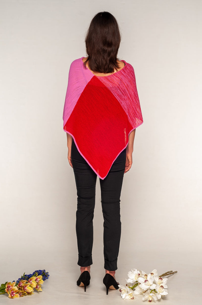 back of the red and pink shaded poncho