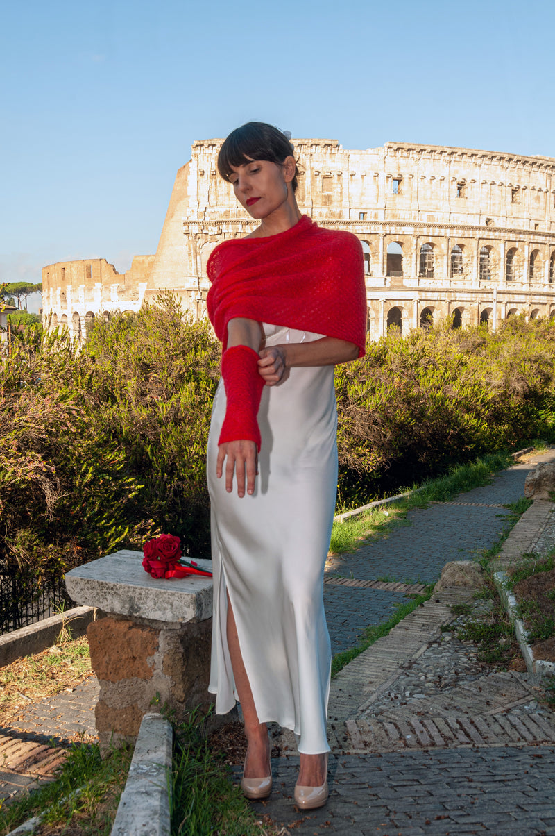 Red shrug can be worn with or without matching sleeves