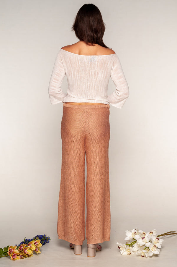 Back view of white viscose knit with boat neckline